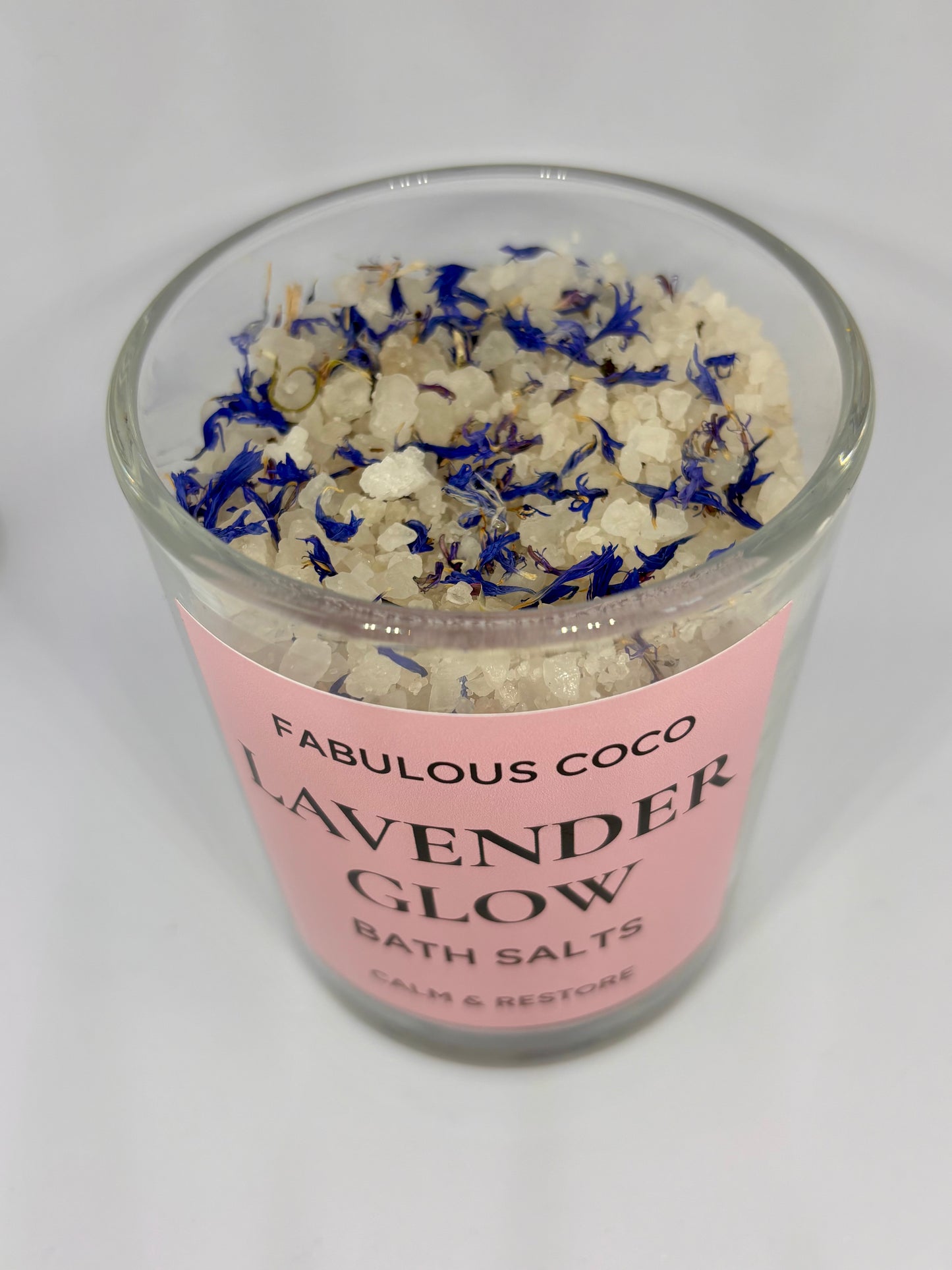 Lavender Glow Bath Salts with Himalayan and Epsom salt topped with real lavender buds in a clear jar