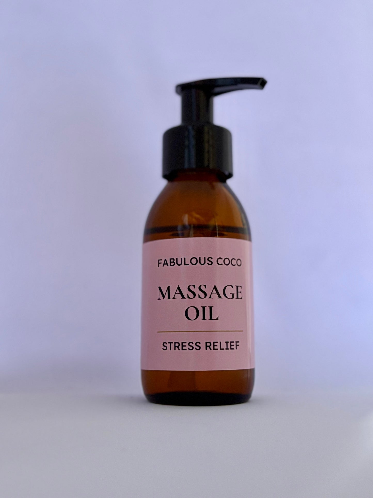 Stress Relief Massage Oil 100ml in amber bottle with pump, designed for calming aromatherapy and relaxation. 